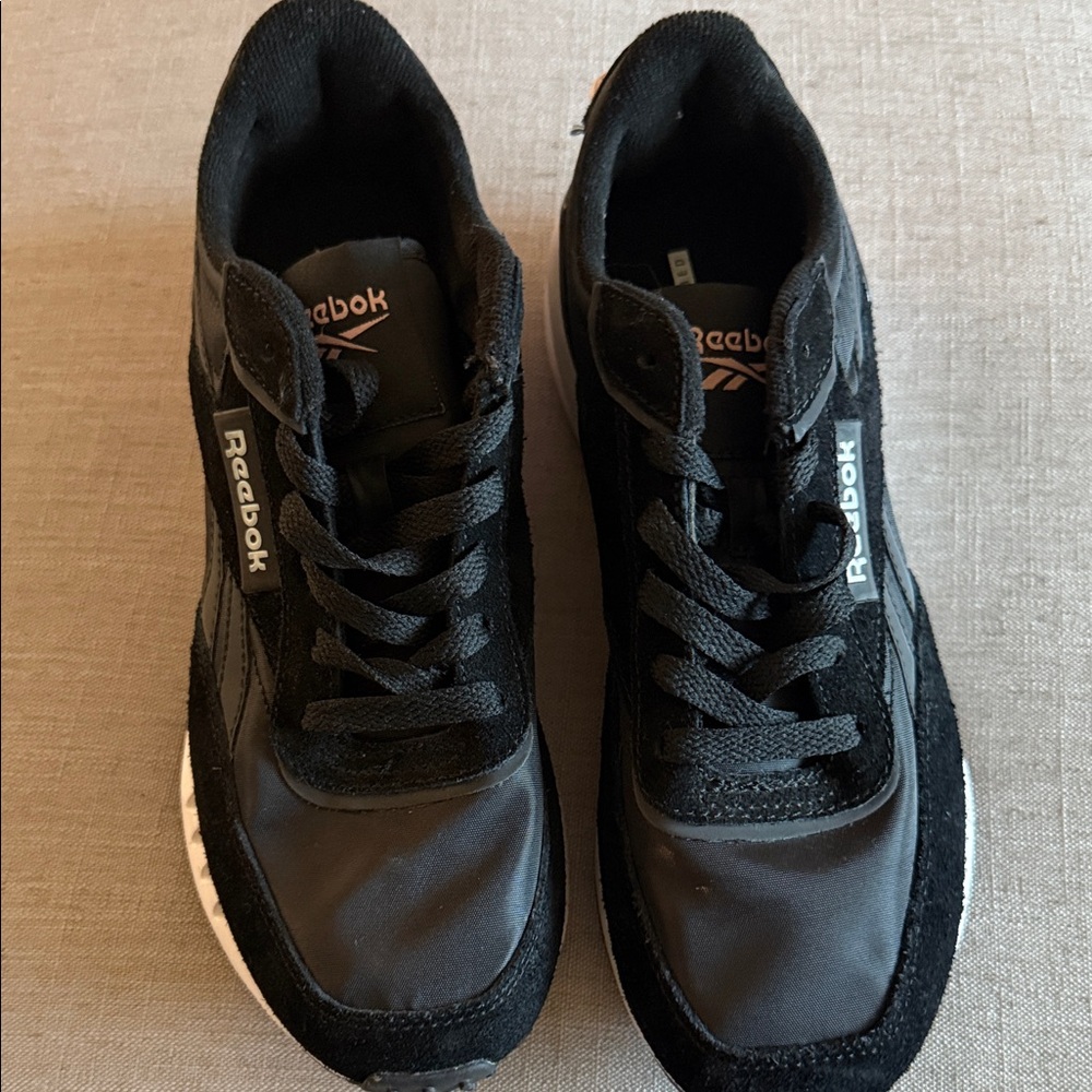 Reebok women’s  Black and White Sneakers